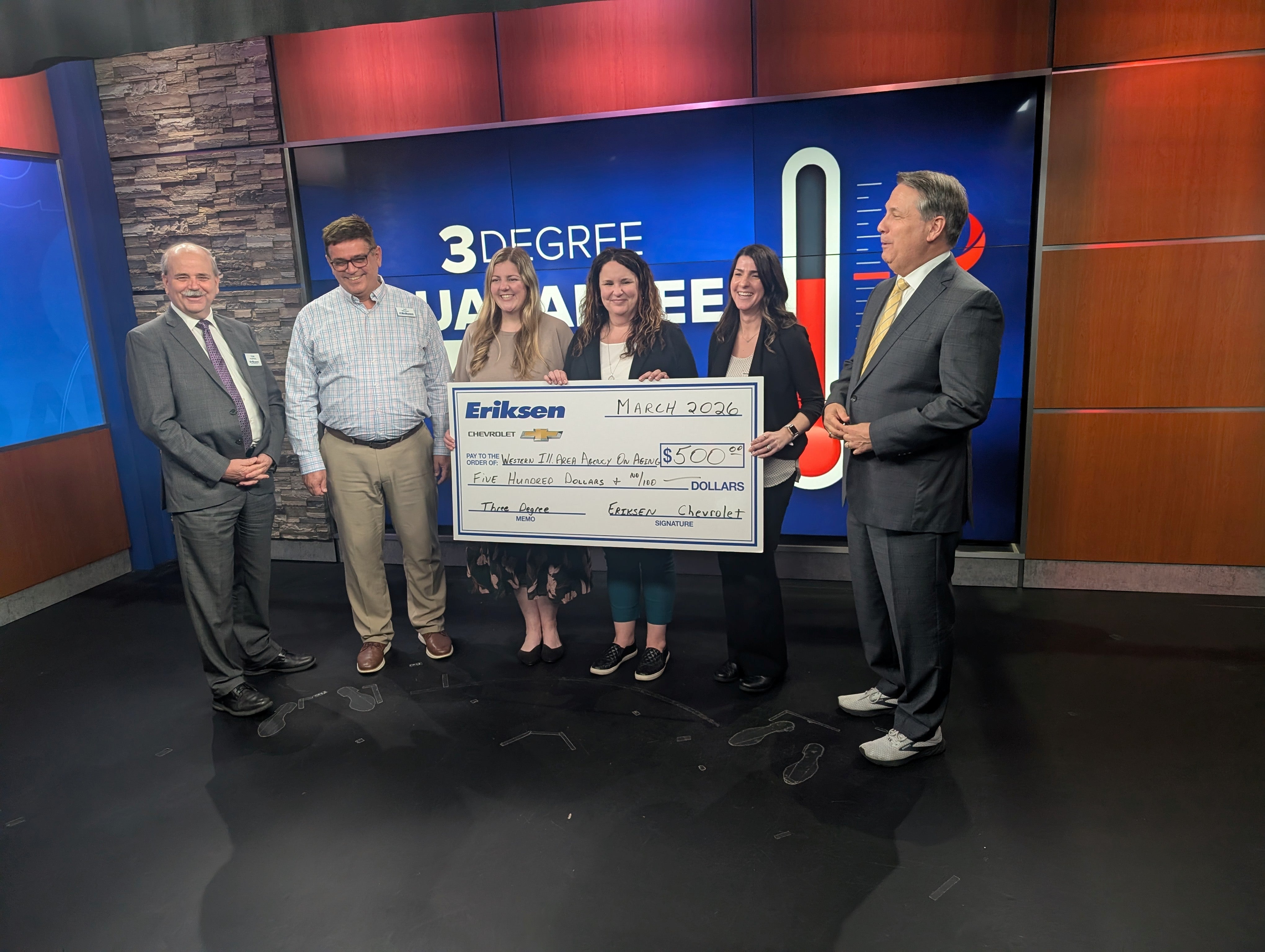 Pictured from left are Tom and Jeff with Eriksen Chevrolet; Katy Deadmond, Amy Phillips and Lacey Matkovic with the Western Illinois Area Agency on Aging; and James Zahara with WQAD.